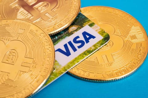 Coinbase et Visa lancent une nouvelle fonctionnalité pour le trading de Bitcoin et crypto